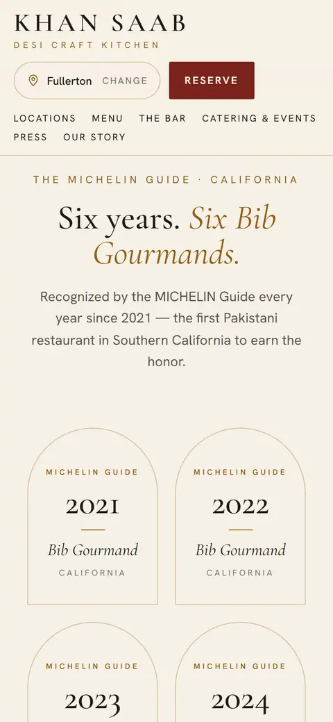 Wall of MICHELIN Bib Gourmand awards, phone